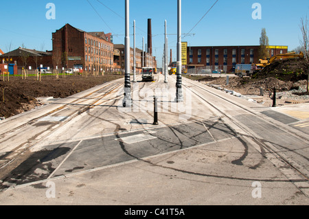 Manchester Metrolink-Straßenbahn im Bau in der Nähe von Piccadilly Station, Manchester, England, UK Stockfoto