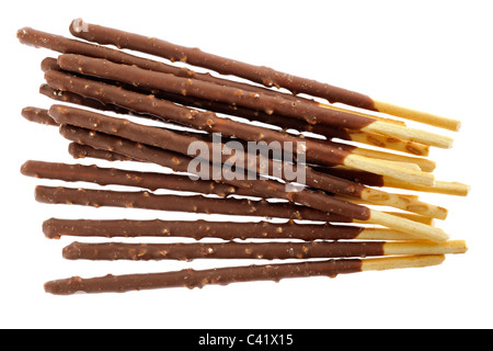 Haufen von neuen Glico Mikado völlig Haselnüsse Vollmilchschokolade sticks mit Haselnuss-Stücke Stockfoto