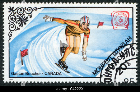 Mongolei-985: Eine Briefmarke gedruckt in der Mongolei, bis der Winter Olympiade Sarajevo-1984, Gaetan Boucher widmet Stockfoto