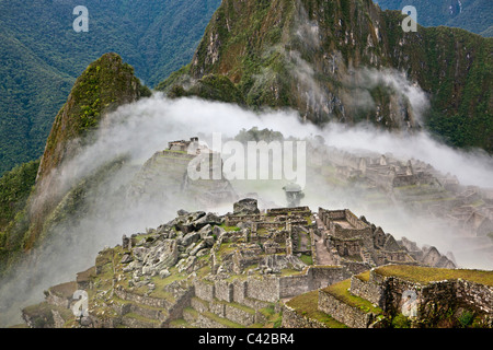 Peru, Aguas Calientes, Machu Picchu.15th-Jahrhundert Inkastätte liegt 2.430 Meter (7.970 ft) über dem Meeresspiegel. Stockfoto