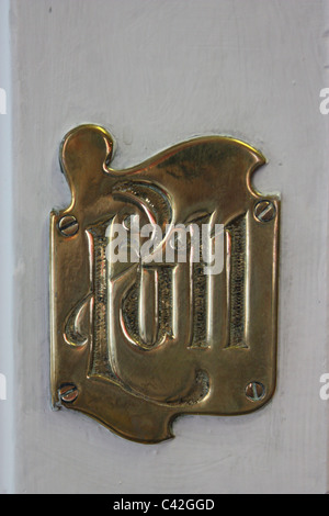 Viktorianische Türschild Messing Stockfoto