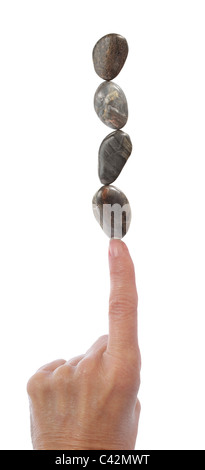 Hand-Balance-Steinen am Finger Stockfoto