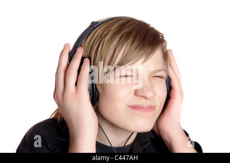 Teenager im Kopfhörer hört Musik Stockfoto