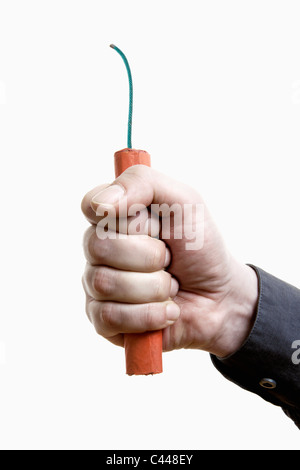 Ein Mann hält einen Stock des Dynamit, Nahaufnahme von hand Stockfoto