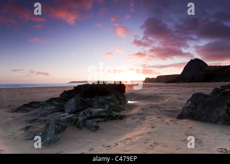Sonnenuntergang am Strand (Pobbles) in Süd-Wales Stockfoto