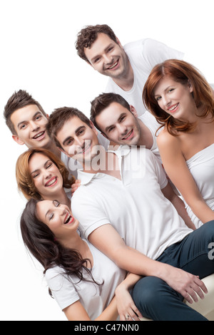 Gruppe junger Menschen sitzen, die Spaß Stockfoto