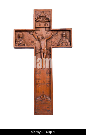 Hölzernes Schnitzen von Jesus am Kreuz; isoliert auf weißem Hintergrund. Stockfoto