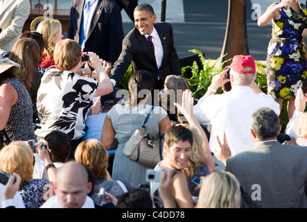 Präsident Barack Obama begrüßt das Publikum während einer Veranstaltung. Stockfoto