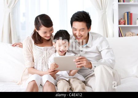 Glückliche junge Familie Stockfoto