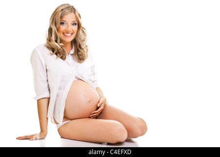 Schwangere Frau isoliert auf weiss Stockfoto