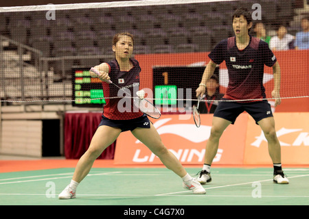 Hayakawa Kenichi und Misaki Matsutomo Japans während der Mixed-Doppel Runde 1 der Li-Ning Singapore Open 2011. Stockfoto