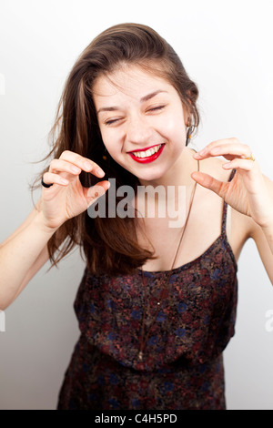 Porträt eines Teenagers lachen, London, England, UK Stockfoto