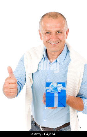 Elegante moderne reifer Mann Bleu vorhanden Daumen hochhalten Stockfoto