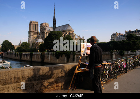 Ein Künstler auf Pont l'Archeveque Malerei Notre Dame de Paris Stockfoto