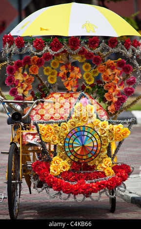 Eine farbenfrohe Rikscha in Melaka, Malaysia Stockfoto