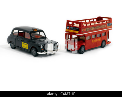 Schwarzes Taxi Cab und London Sightseeing Bus Souvenirs aus London Stockfoto