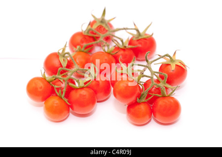 Cherry-Tomaten Closeup isoliert auf weiss Stockfoto