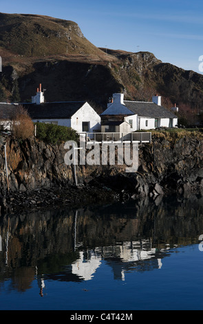 Das malerische Dorf von Ellenabeich (häufig genannt Easdale) auf der Insel Seil mit seinen Hütten gebaut für die Schiefer quarrie Stockfoto