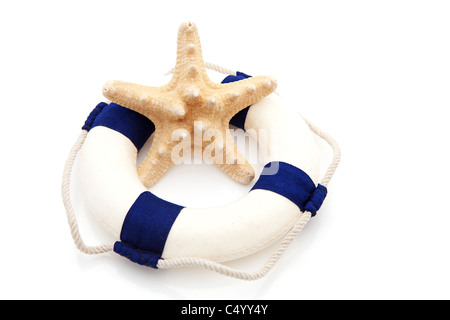 summer gear; starfish and life buoy over white background Stockfoto
