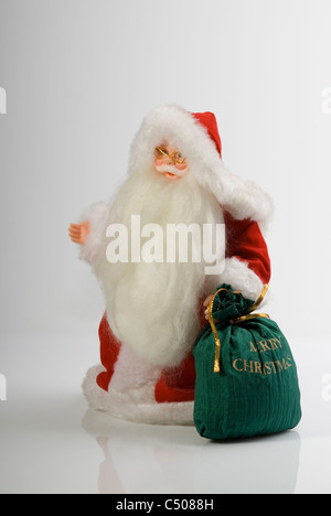 Santa Claus mit meschotschek voller Geschenke. Stockfoto