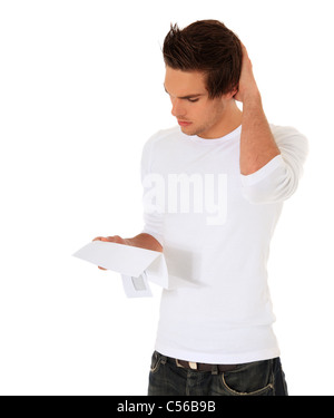 Attraktive junge Mann immer schlechte Nachrichten. Alle auf weißem Hintergrund. Stockfoto