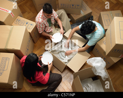 Familie Kartons Auspacken Stockfoto