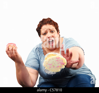 Große Frau fallen cupcake Stockfoto