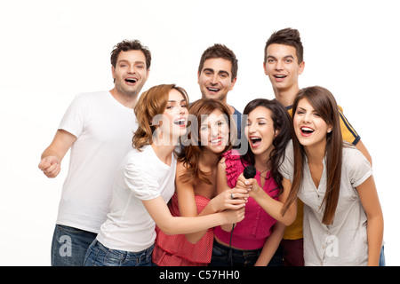 Gruppe von jungen, die Spaß an Karaoke pople Stockfoto