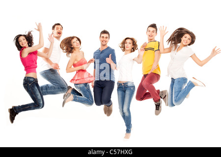 junge Gruppe von casual, lächelnde Menschen springen Stockfoto