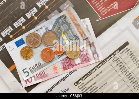 Finanzkrise, Griechenland, Zeitung, Artikel, Nachrichten, Griechisch, Münzen, Euro, griechischen Euro-Banknoten Stockfoto