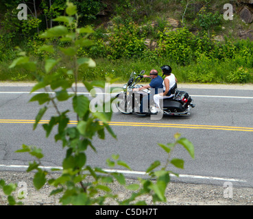 Paar auf einer Harley Davidson Motorrad Motorrad. Stockfoto