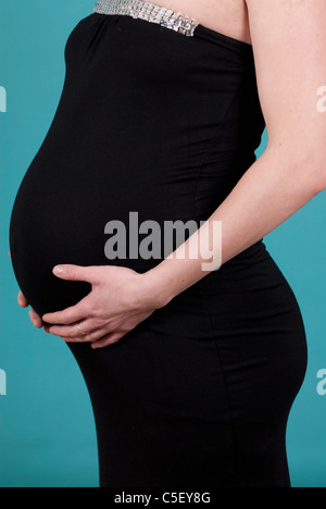 Schwangere Frau mit Bauch Stockfoto