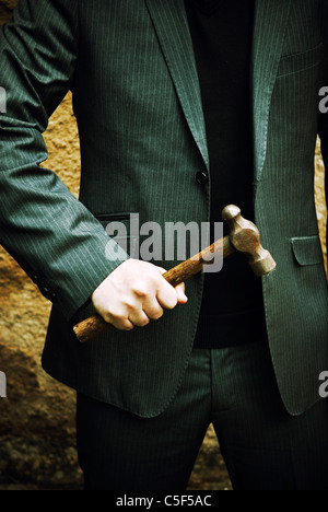 Mann mit einem hammer Stockfoto