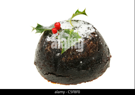 Christmas Pudding mit Zucker bestäubt und dekoriert mit einem Holly-Zweig Stockfoto