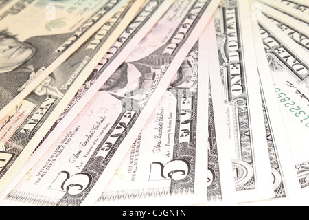 ein Stapel von vielen bunten Dollarnoten Stockfoto
