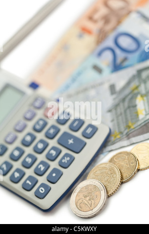 Bargeld und Münzen Hexe Taschenrechner Stockfoto