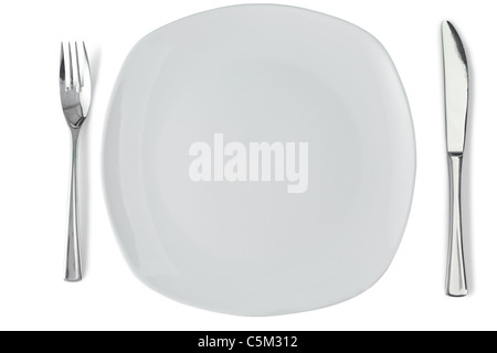 Weißen Teller mit silbernen Messer und Gabel Stockfoto