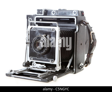 Eine 4 x 5 Krone Grafik amerikanischen Presse wohl c.1958 mit einem 1930er Jahre Kodak Kameralinse in einem Ilex-Shutter, isoliert auf weiss. Stockfoto