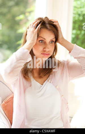 Besorgt Frau Stockfoto