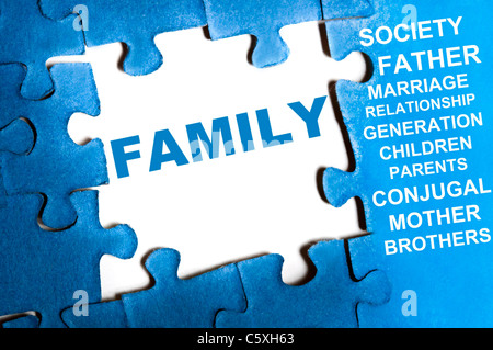 Familie blau Puzzleteile zusammengesetzt Stockfoto