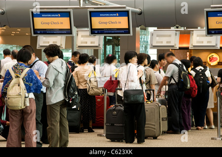 Singapore Airlines Group Check-in Schalter, Abflughalle im Terminal 3 des Changi Airport, Singapore Stockfoto