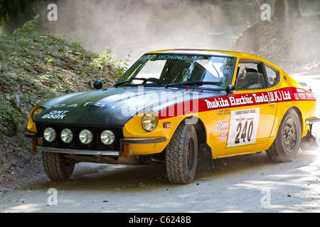 1972-Datsun 240Z mit Fahrer Kevin Bristow auf der 2011 Goodwood Festival of Speed, Sussex, England, UK. Stockfoto