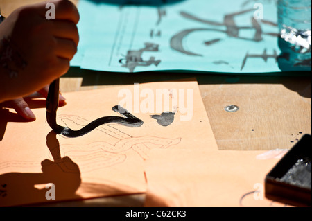 Chinesische Kalligraphie lernen in Calgary Chinatown Stockfoto