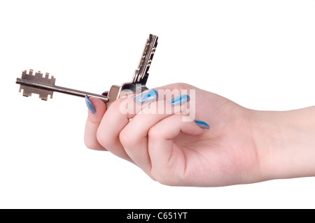 Ausgestreckte Hand, die paar Hausschlüssel, auf weißen Hintergrund isoliert Stockfoto