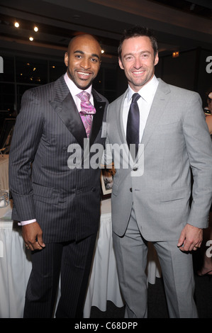 David Tyree, Hugh Jackman bei der Ankunft für Kinder der Stadt 2010 Benefiz-Gala, Pier 60 bei Chelsea Piers, New York, NY 30. September 2010. Foto von: Rob Rich/Everett Collection Stockfoto