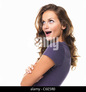 Studio-Porträt der schönen Frau, die überrascht Stockfoto