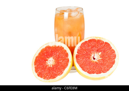 Frisch geschnitten Sie, Grapefruit und ein Glas Saft Stockfoto