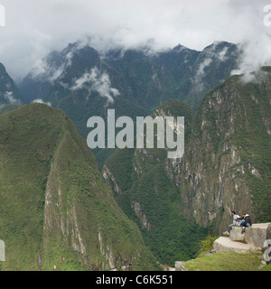 Touristen in die verlorene Stadt der Inkas, Machu Picchu, Cusco Region, Peru Stockfoto