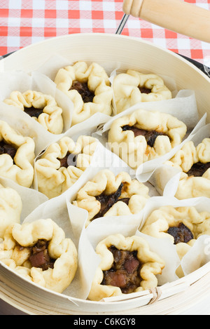 Gedämpftes Schweinefleisch gewann Tonnen (Baozi) Stockfoto