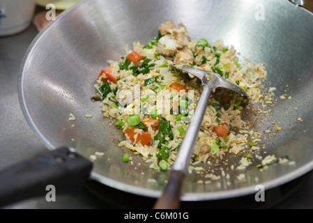 Gebratener Reis mit Huhn oder Schwein Stockfoto